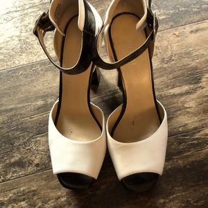 Open black and white toe high heels